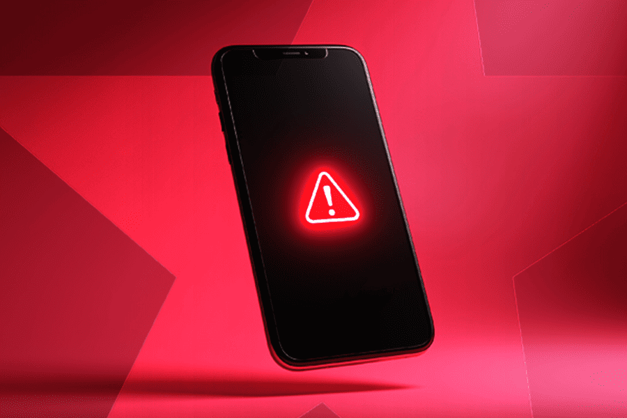 Smartphone displaying a glowing red neon warning triangle alert icon on a red background – Bet Blocker app features and how to block gambling access on mobile